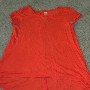 orange/ salmon color shirt